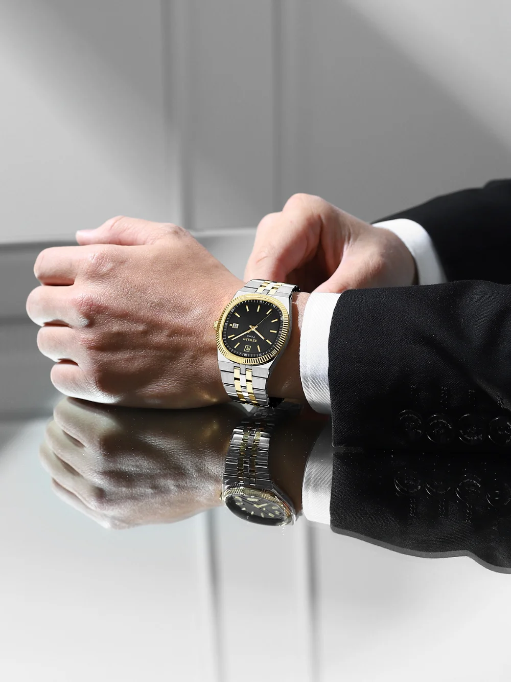 The watch worn on a wrist in a casual setting